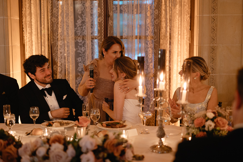Emotional speeches over candlelit dinner at The Armour House in Lake Forrest, Illinois